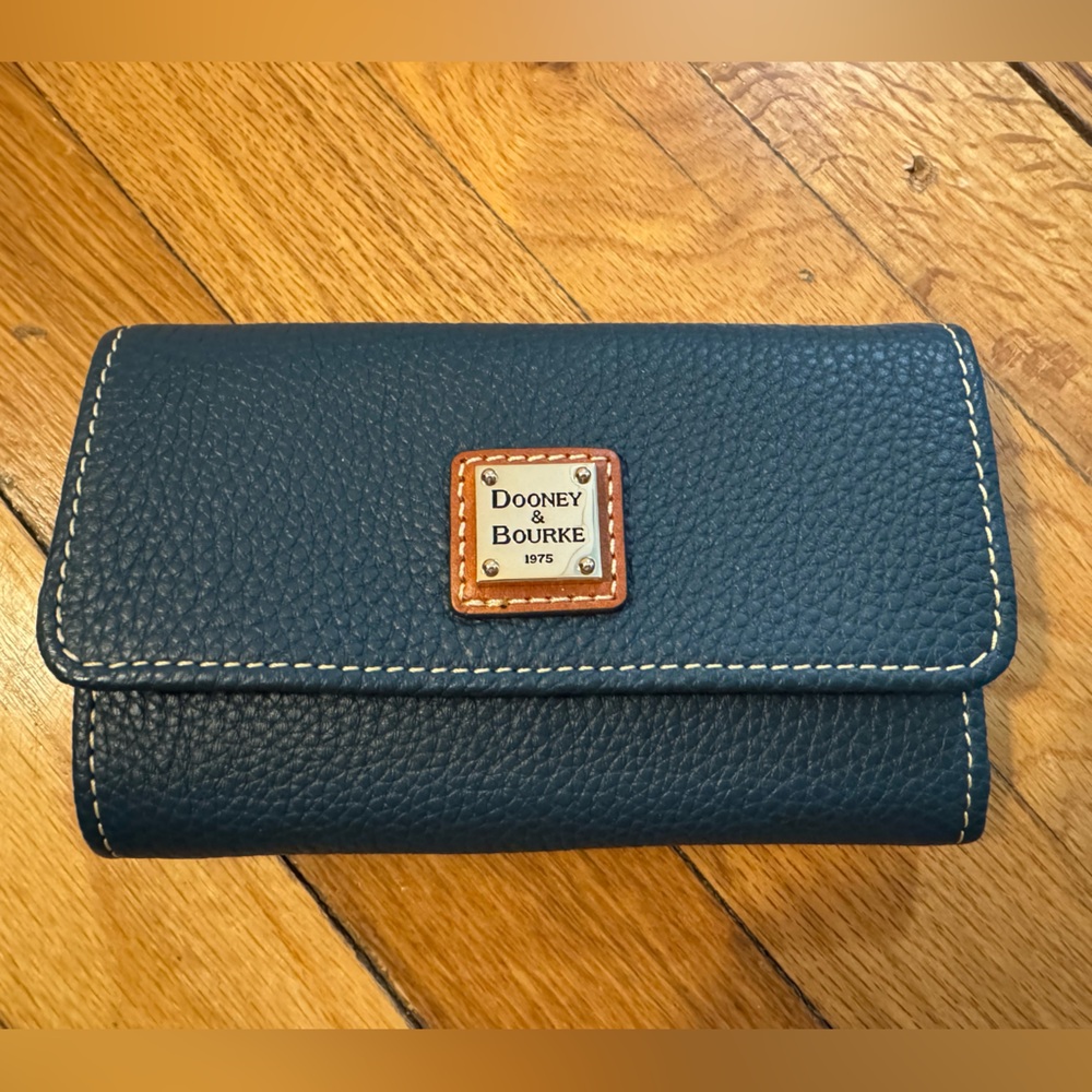 Dark teal NWOT wallet from Dooney and Bourke